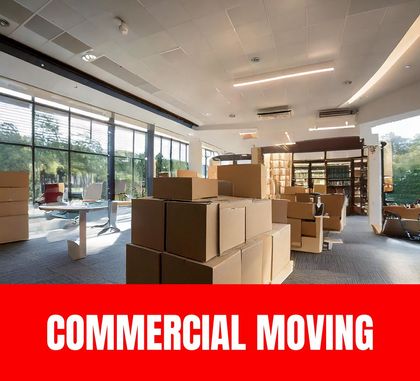 Skilled moving team relocating office equipment and furniture for a business move.