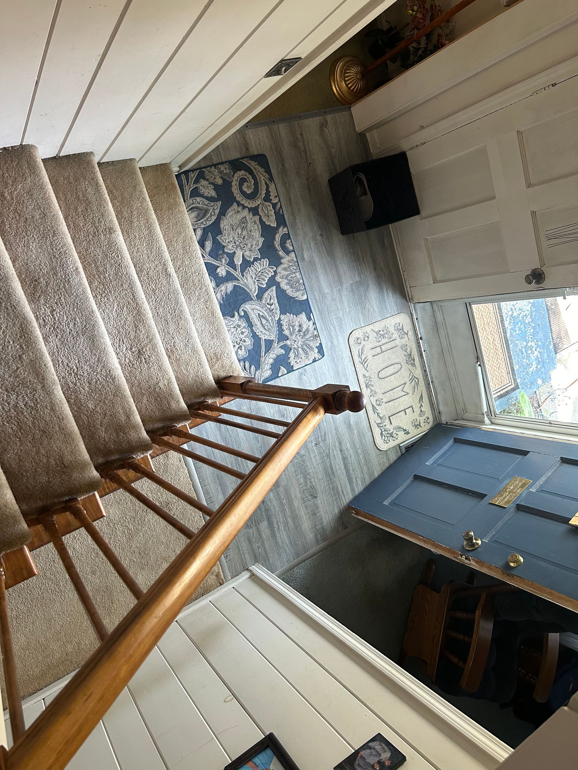 A staircase leading up to the second floor of a house
