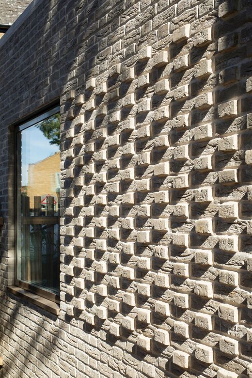 A house renovation with designer brickwork and glazing
