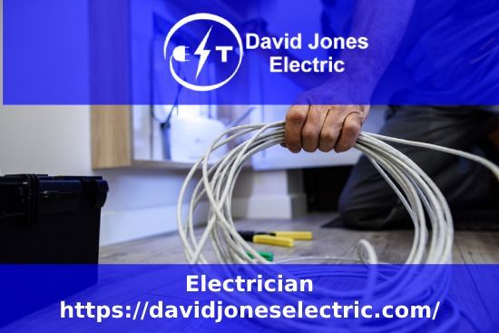 An ad for david jones electric shows a person holding a coil of wires