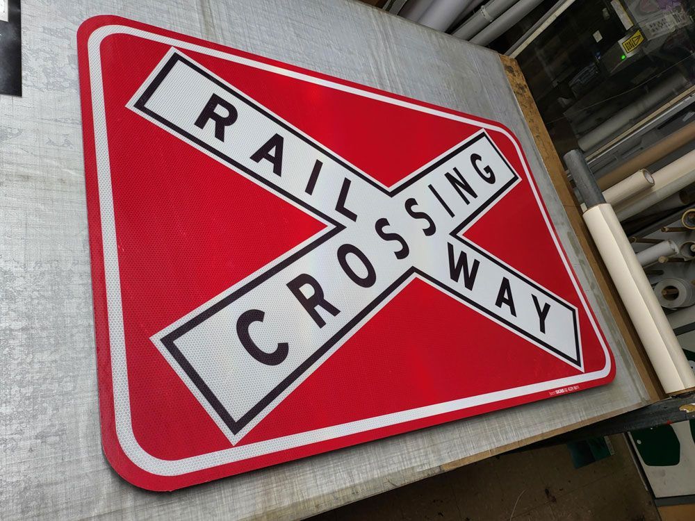 Aluminum Railway Crossing Traffic Signage — Signwriters in Coniston, NSW