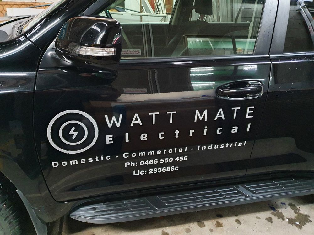 Watt Mate Electrical Door Vinyl — Signwriters in Coniston, NSW