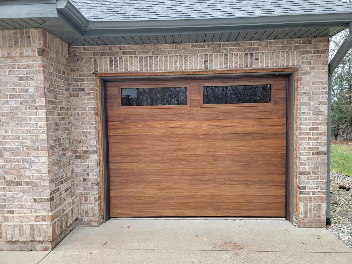 Textured steel door with a modern and sleek design.