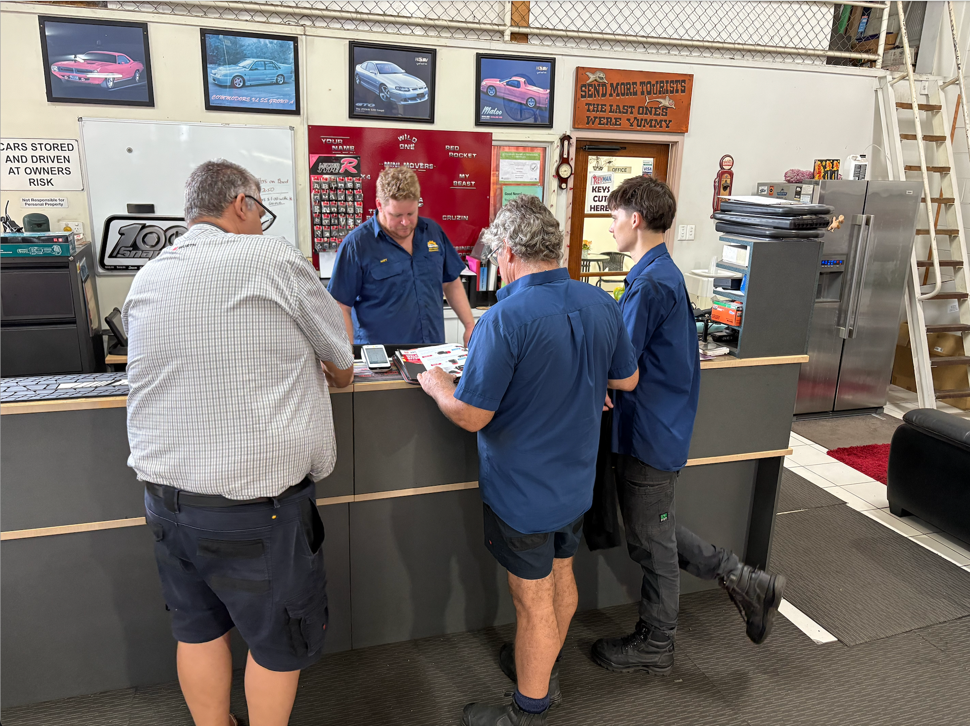 A Close up Of a Person Pouring Oil Into a Car Engine — Monypenny Mechanical in Bungalow, QLD