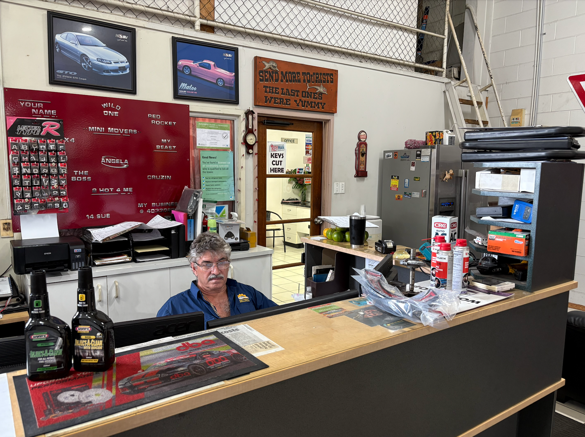 Man Behind Front Desk  — Monypenny Mechanical in Smithfield, QLD