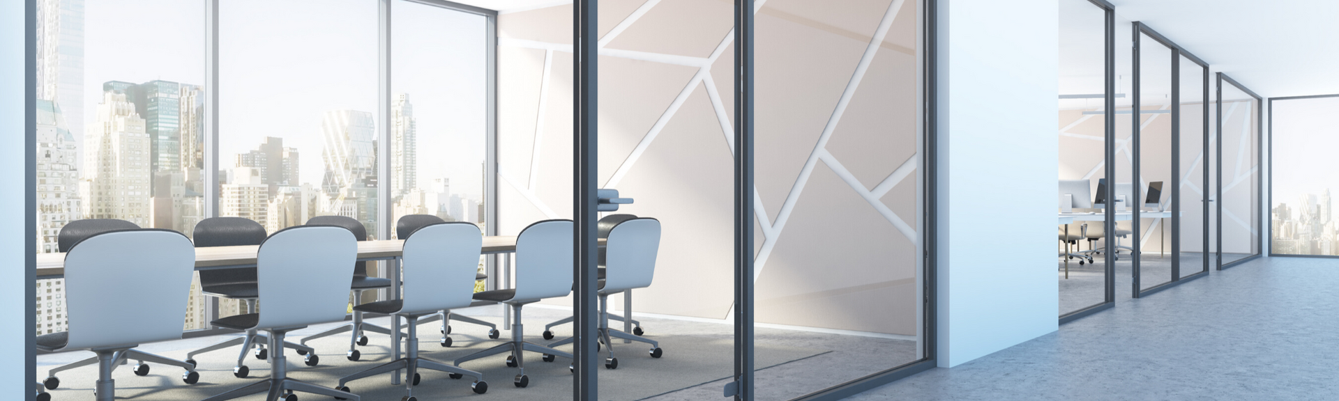 Modern glass conference room with blue chairs, long table, and city skyline view