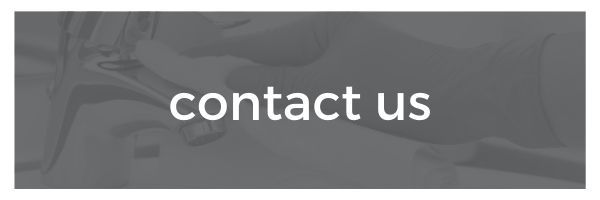 Gray button with white text reading “contact us”