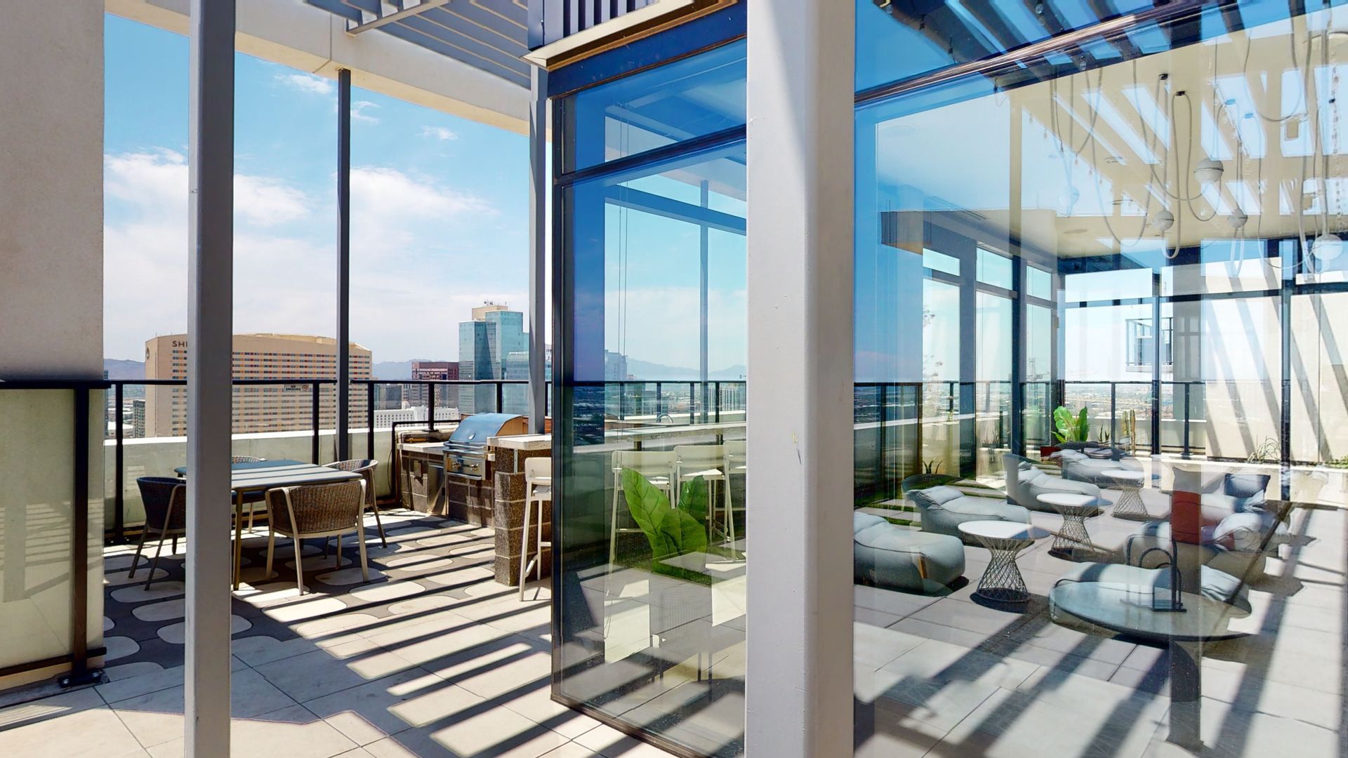 An artist 's impression of a rooftop terrace with tables and chairs.