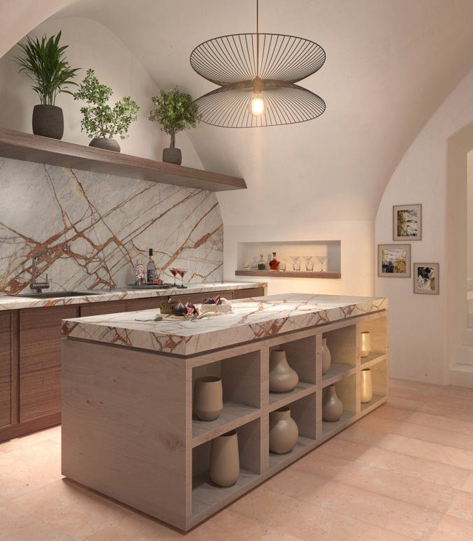 Kitchen with marble countertops, wooden cabinets, and an island with shelves. Plants and a unique light fixture.