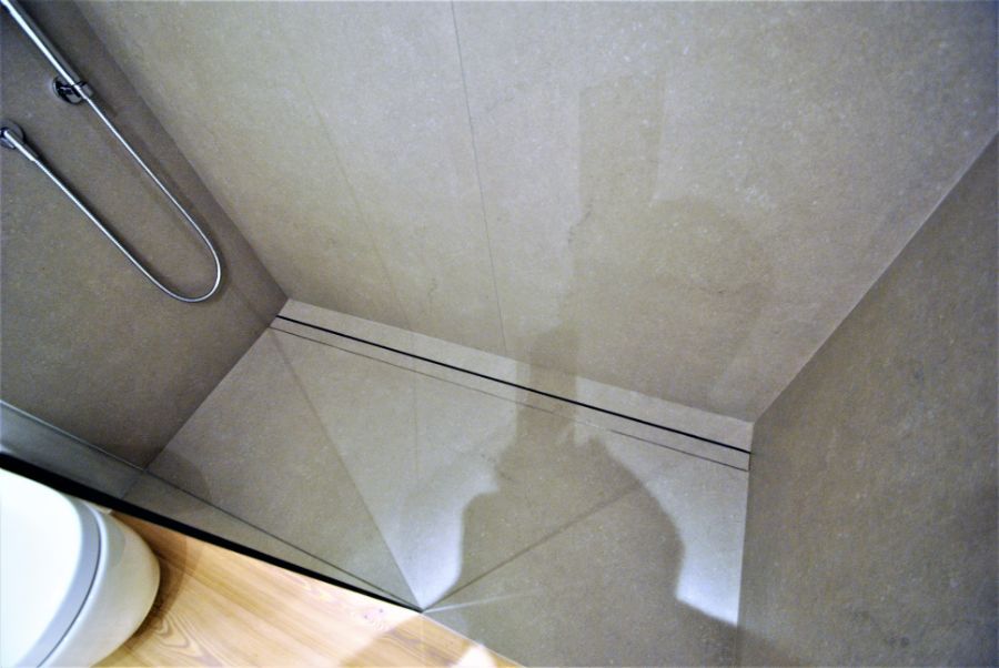 Shower tray fitted