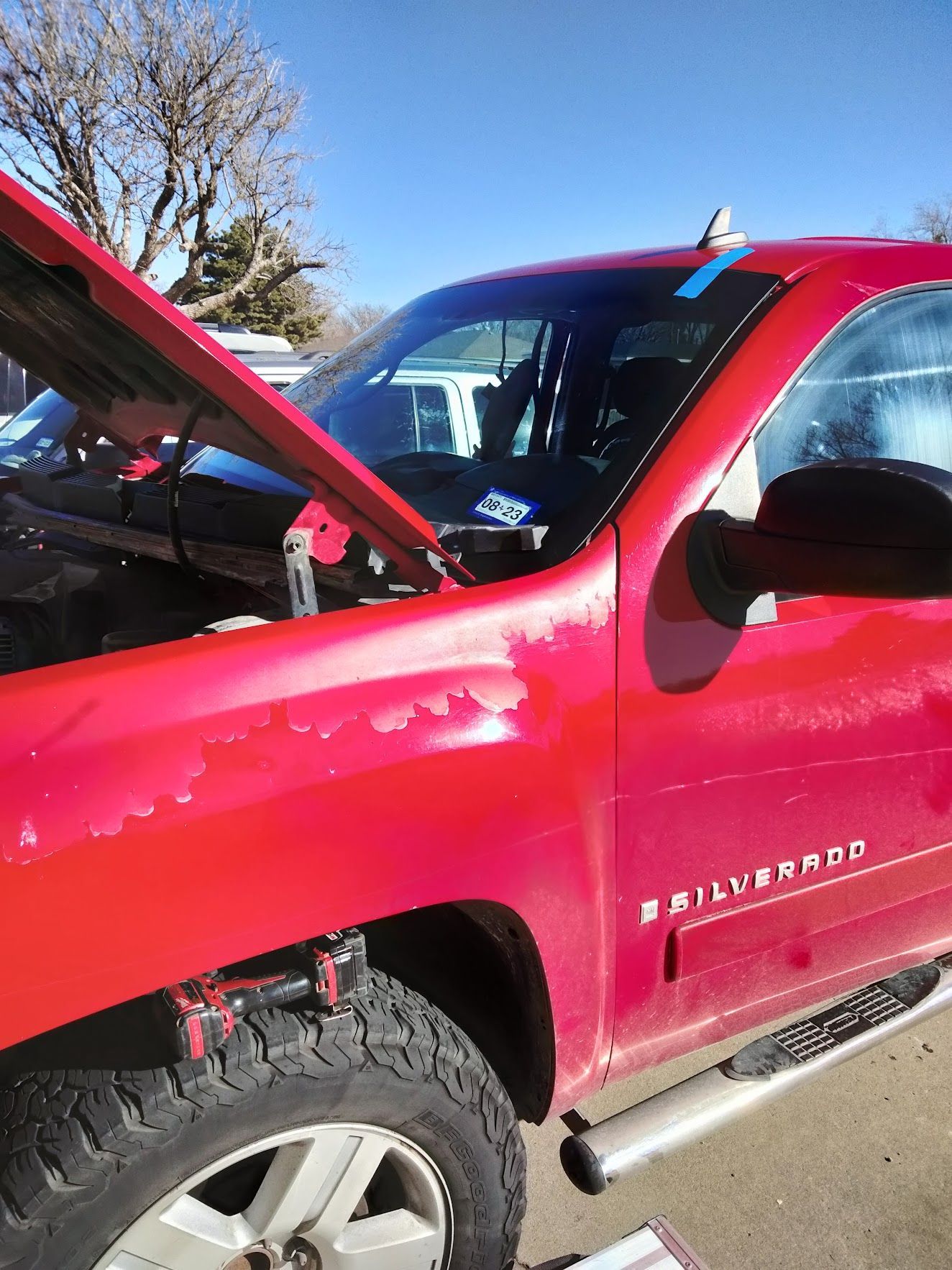 Red Silverado window replacement