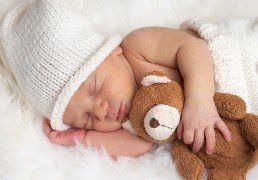 Baby with Stuffed Animal - Baby Toys
