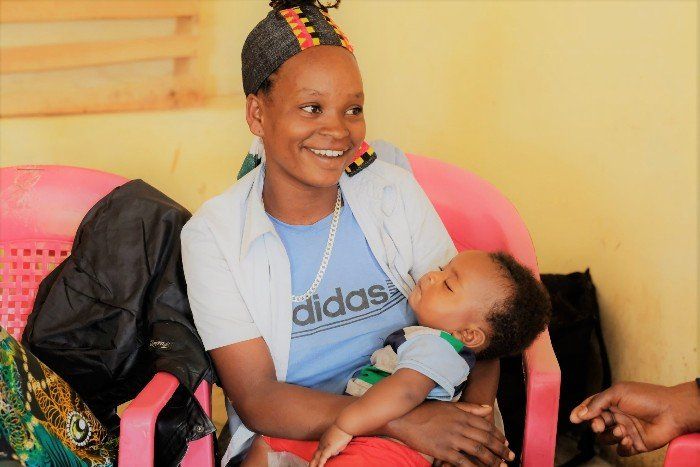 A mother attending with child