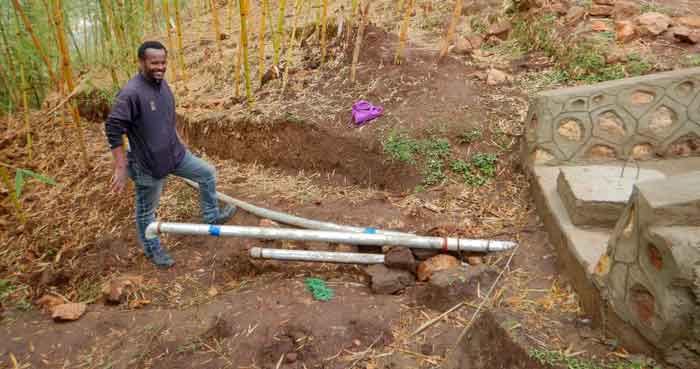 HOPE water system engineer by a capped spring