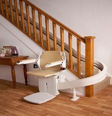 stairlift installed on wooden stairs