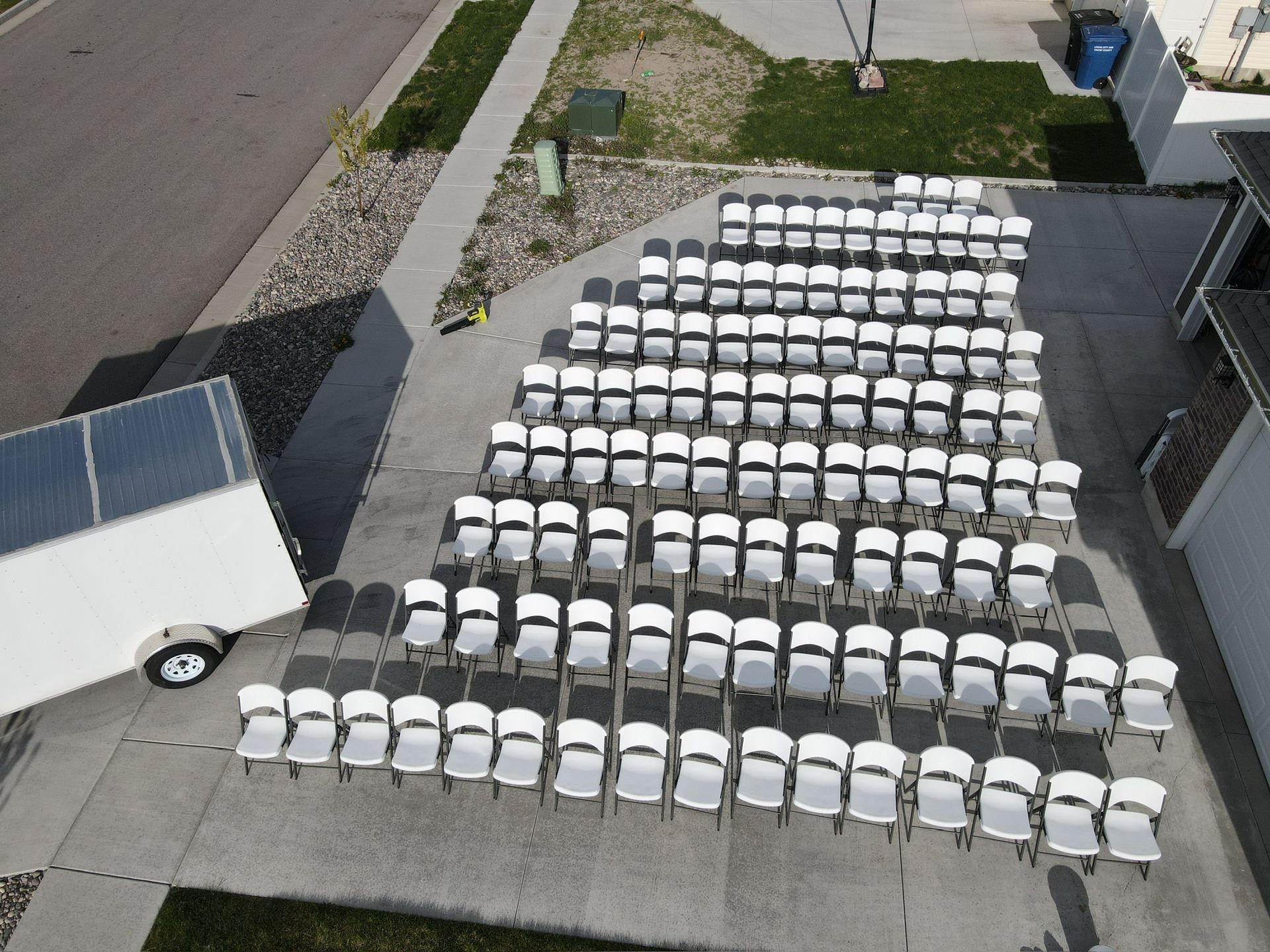 Large quantity of chair rentals staged for an event in Logan Utah