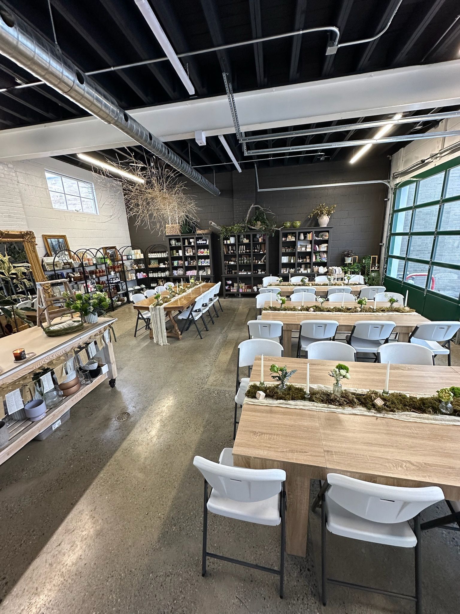 Indoor event table setup with rental tables and chairs for a private event