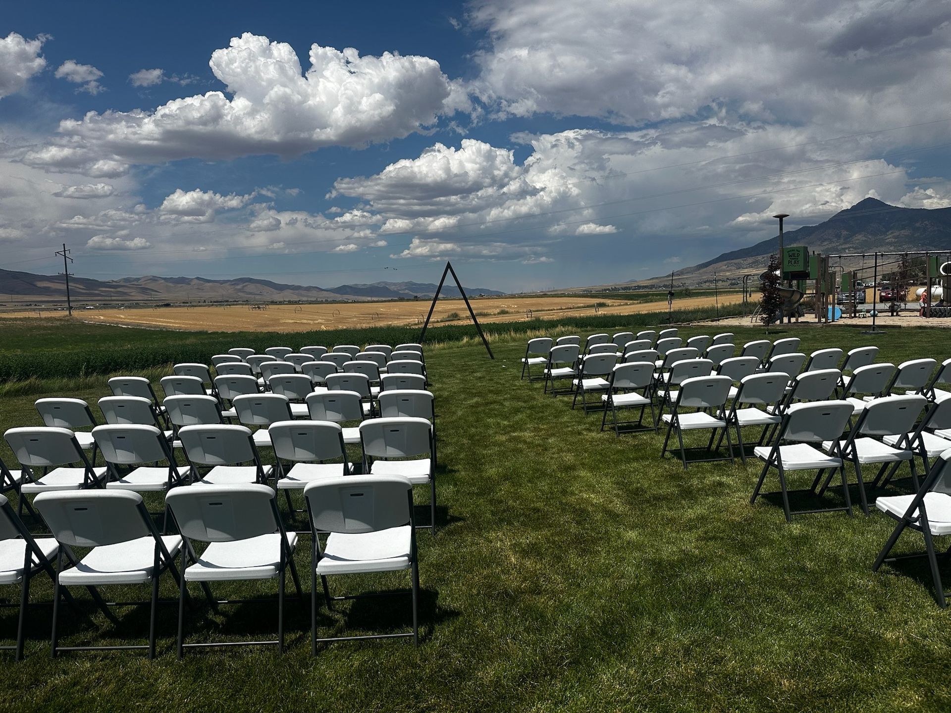 Wedding chair rentals arranged for an outdoor ceremony in Logan Utah