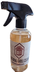 A bottle of natural grill cleaner with a sprayer on a white background.
