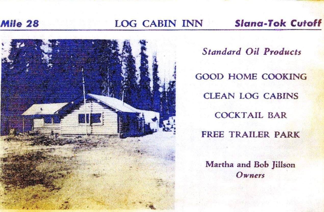 A picture of a log cabin inn in mile 28