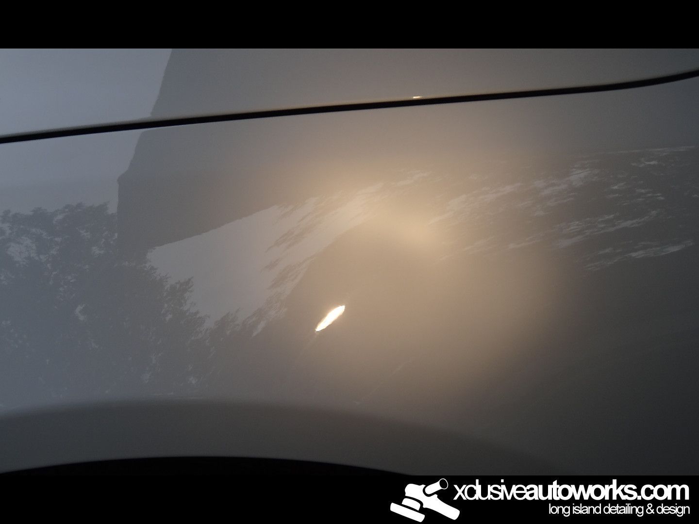 A close up of a car with xdusveautoworks.com written on the bottom