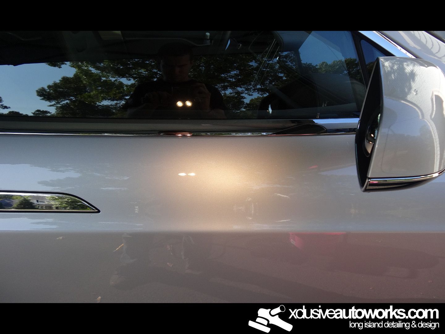 A close up of a car with xdusveautoworks.com written on the bottom