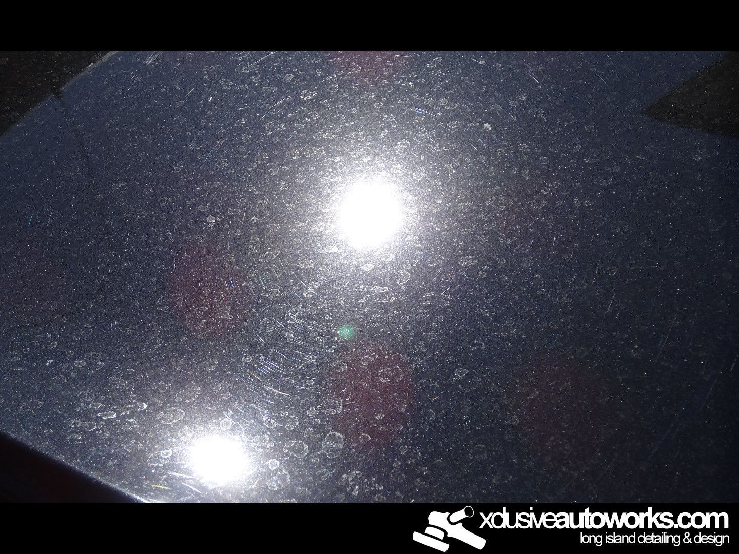 A picture of a car with the website xdusveautoworks.com at the bottom