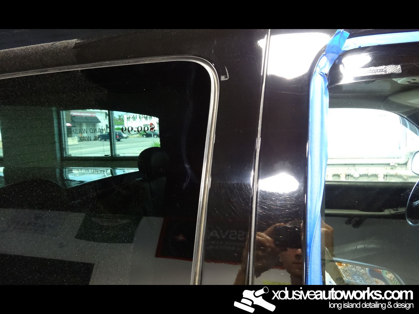 A picture of a car with the website xdusveautoworks.com at the bottom