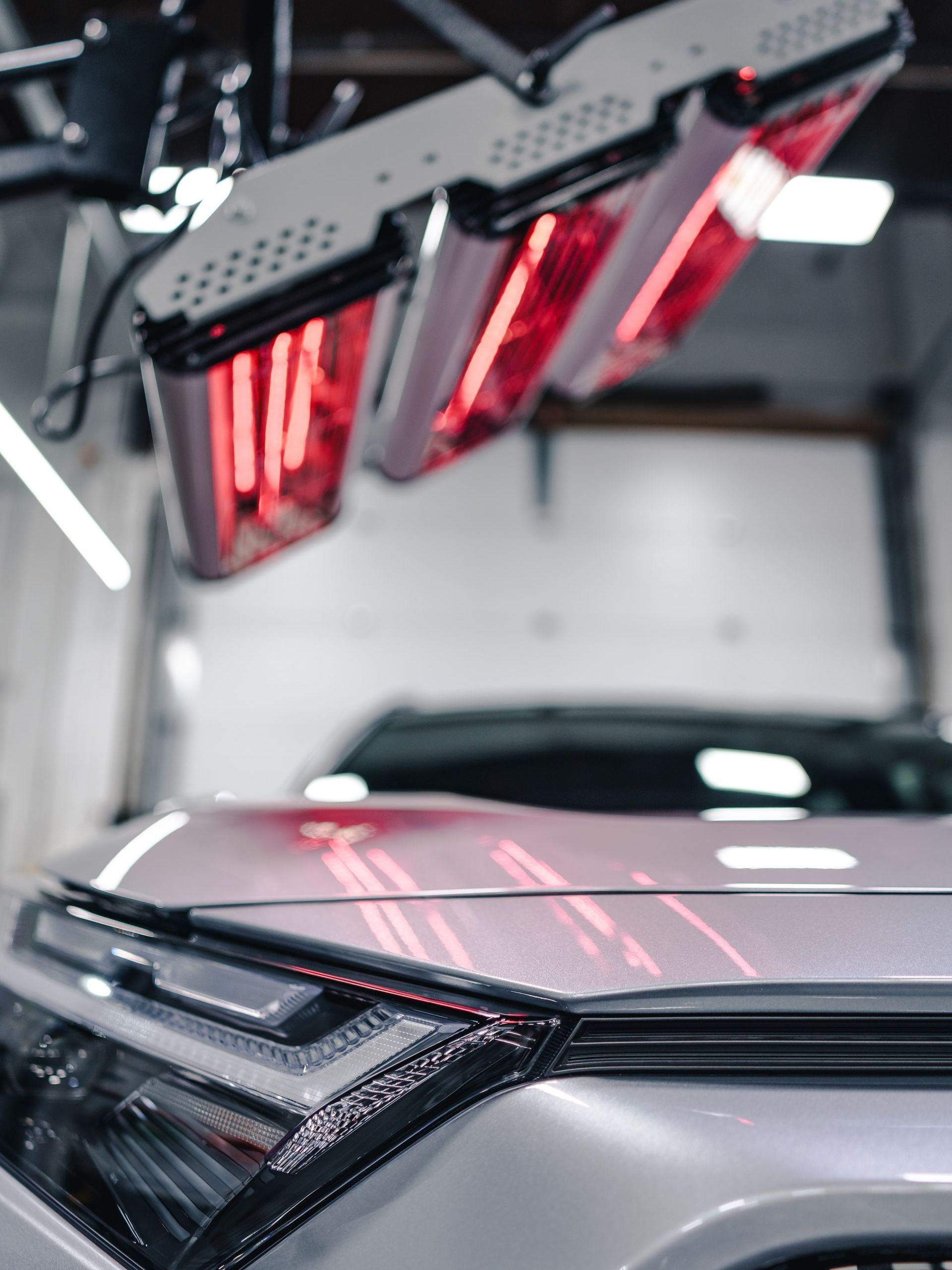 A close up of a car with red lights on it