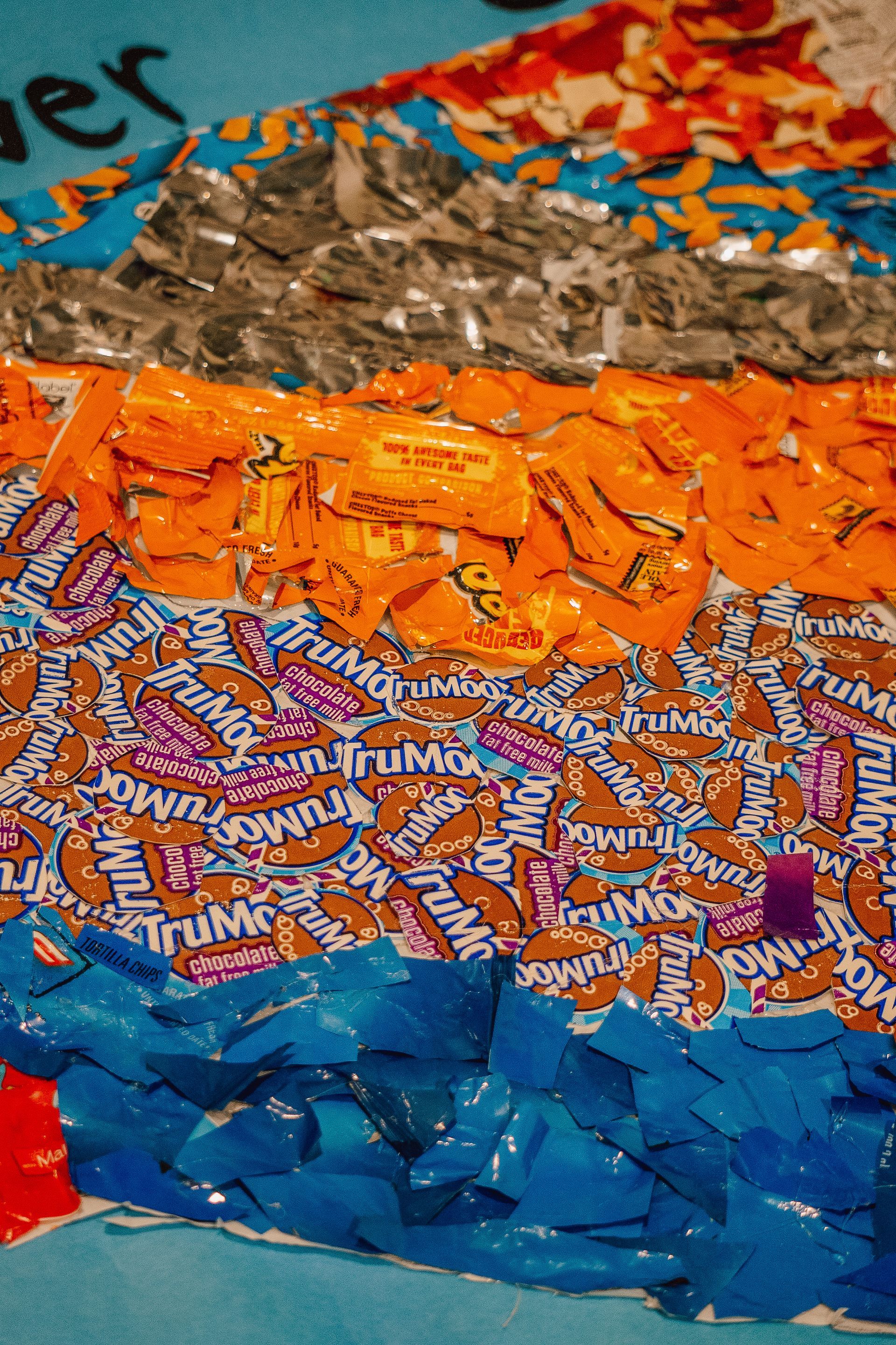 A pile of candy is sitting on a table.