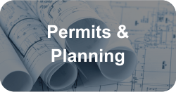 A blueprint with the words permits and planning on it