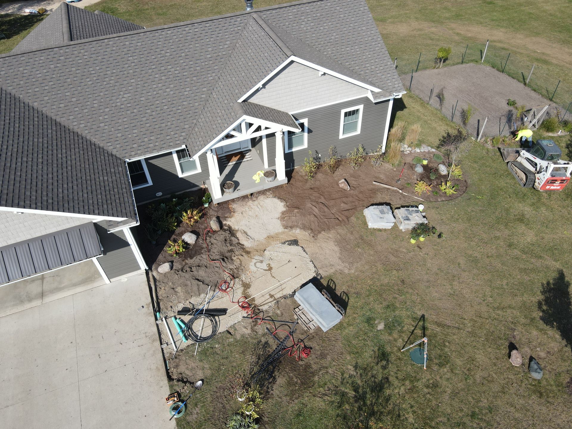 An aerial view of a house that has fallen down.