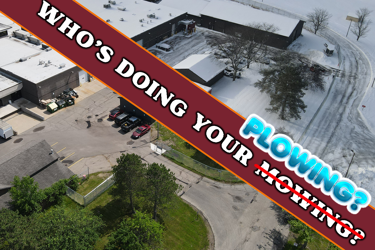 A patio area with a fireplace and a swimming pool at night.