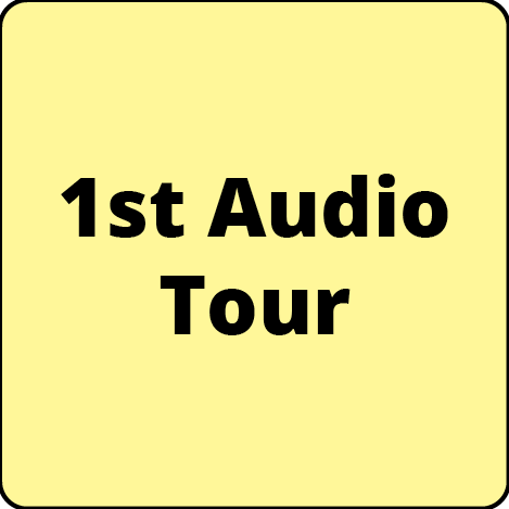 A yellow square with the words `` 1st audio tour '' written on it.