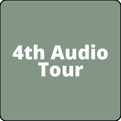 A green square with the words `` 4th audio tour '' written on it.