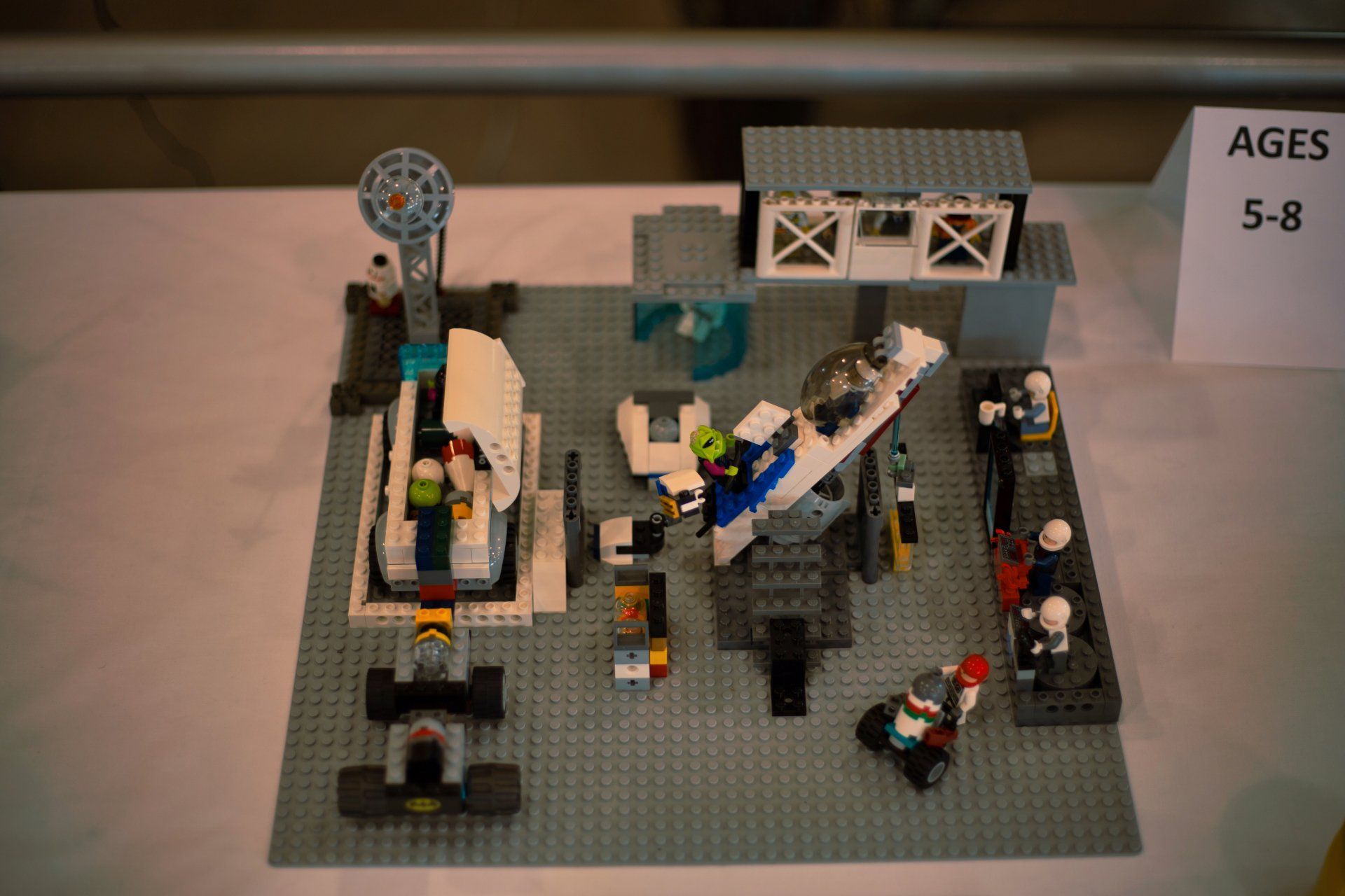 A lego display with a sign that says 5-8 on it