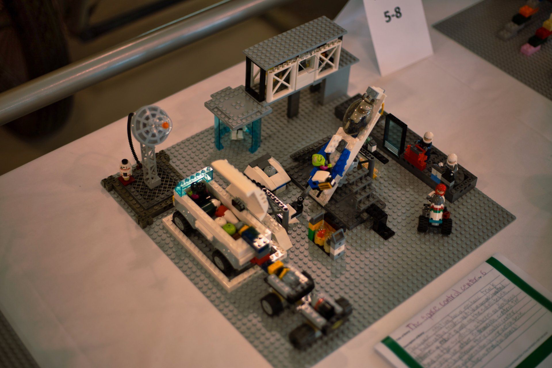 A table with a lot of lego toys on it