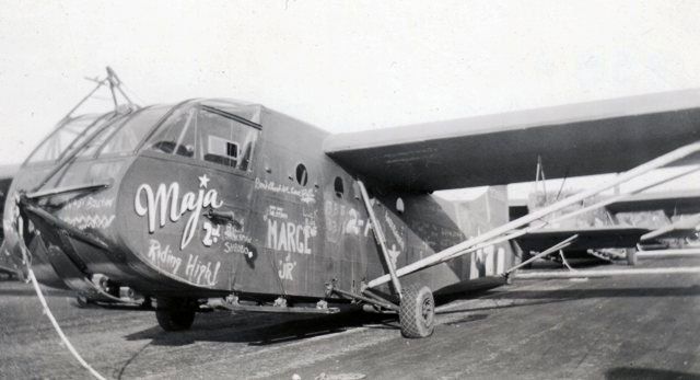 A black and white photo of a plane that says maja on it