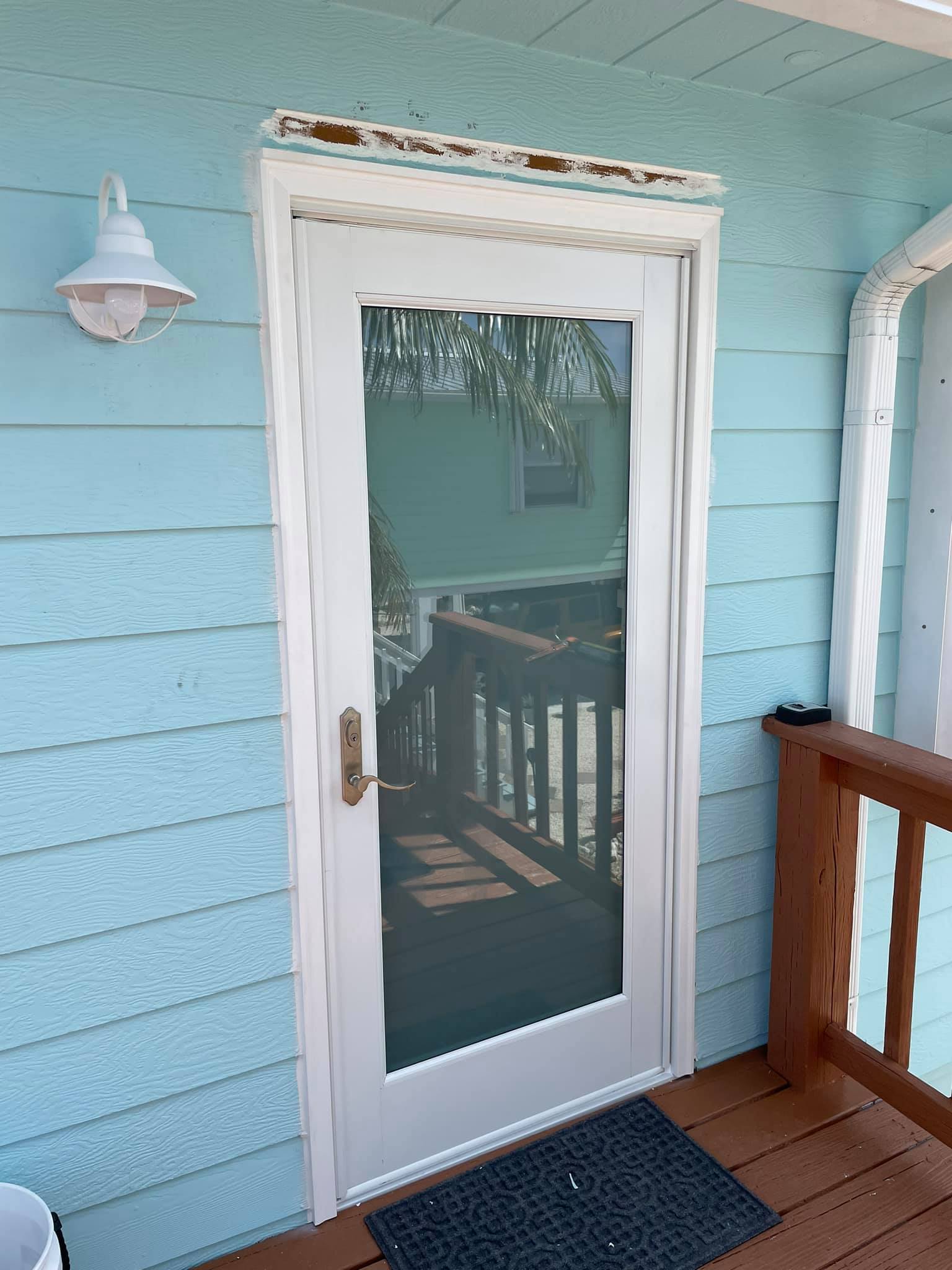 Light Blue House With Glass Door — Marathon, FL — All Keys Glass Inc