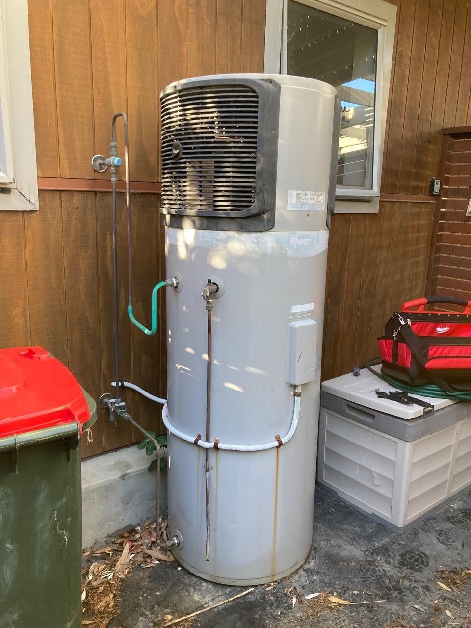 Grey Water Heater Outdoors — JLH Plumbing, Gas & Roofing in South Nowra, NSW