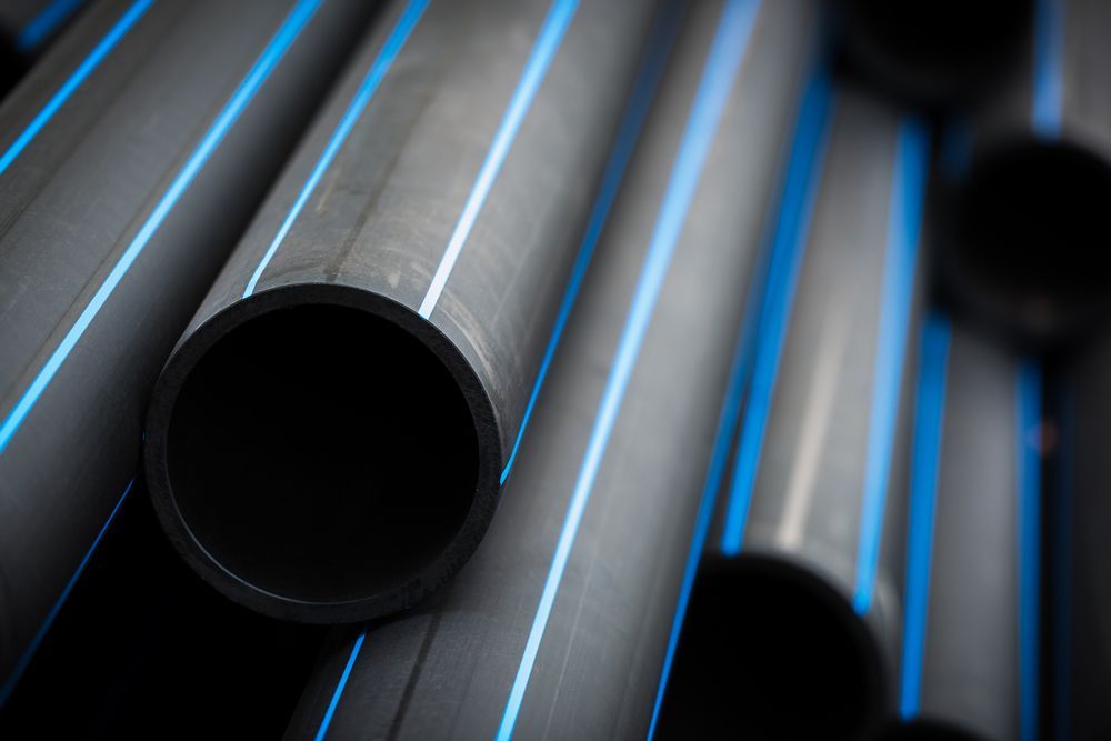 Black Plastic Pipes for Gutter Supplies — Fullerton's Plumbing Manufacture In Woree, QLD