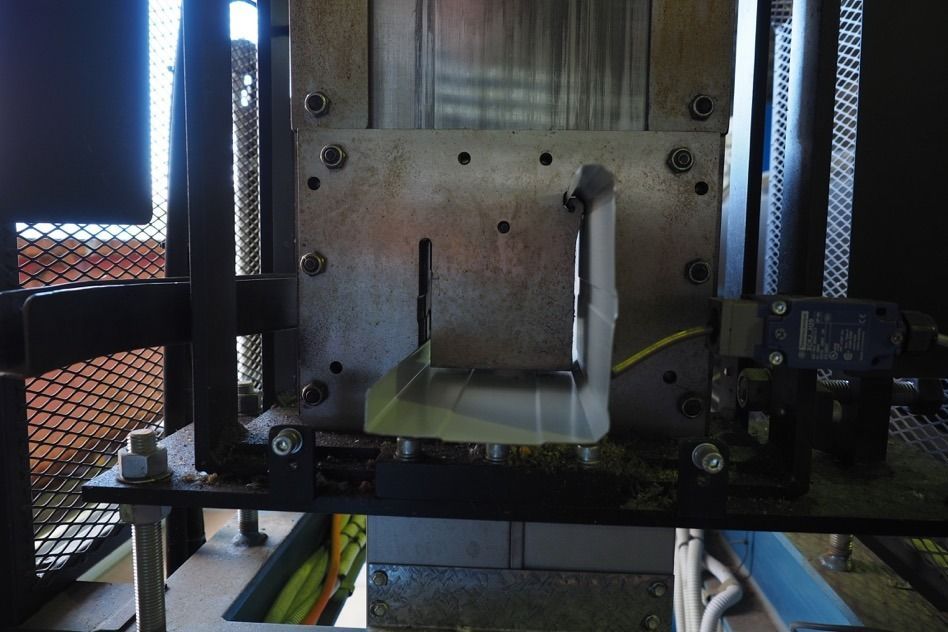 A Piece Of Metal Is Sitting On Top Of A Table — Fullerton's Plumbing Manufacture In Woree, QLD
