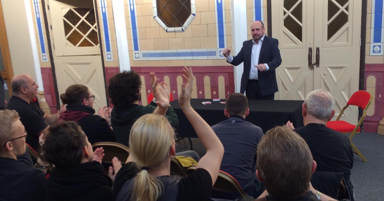 Trade Show Magician Birmingham Paul Roberts attracting crowds at an exhibition
