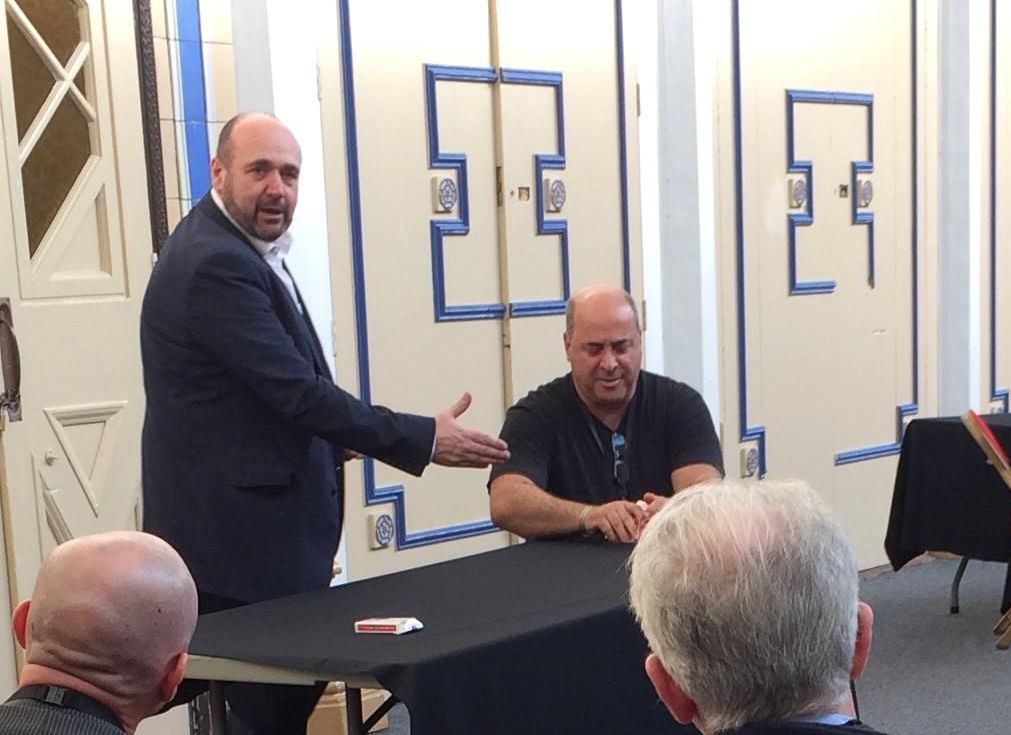 Paul Roberts Teaching business men, how to perform Magic in front of a crowd.