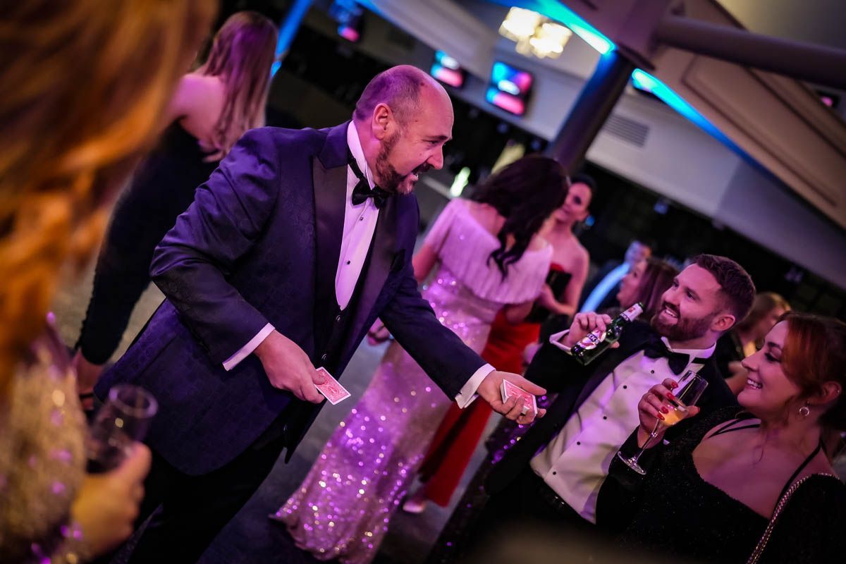 Magician Paul Roberts entertaining guests at a Liverpool city centre hotel