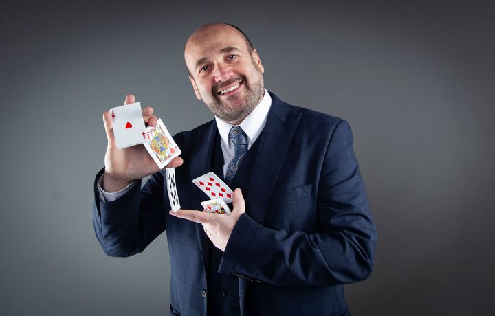 Paul Roberts proving he is a master at sleight of hand magic.
