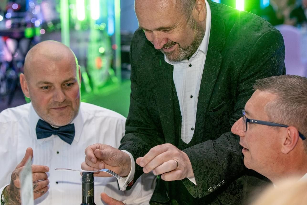 Corporate Magician in Birmingham Paul Roberts at a business event.