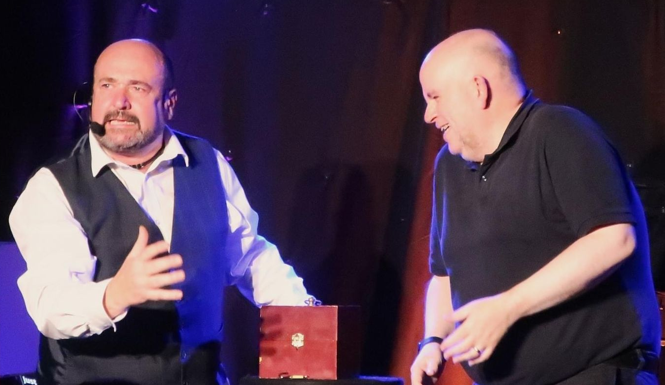 Stand up comedy magic by Paul Roberts.