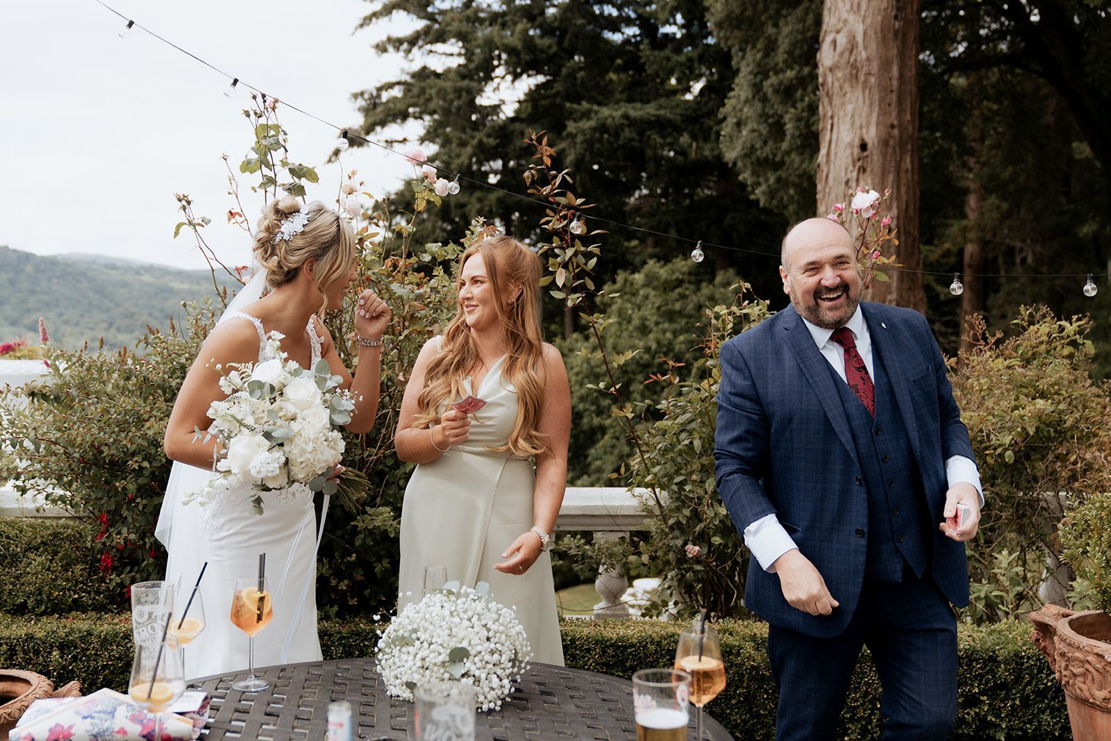 Paul Roberts using his signature magic tricks to bring joy to Newly weds.