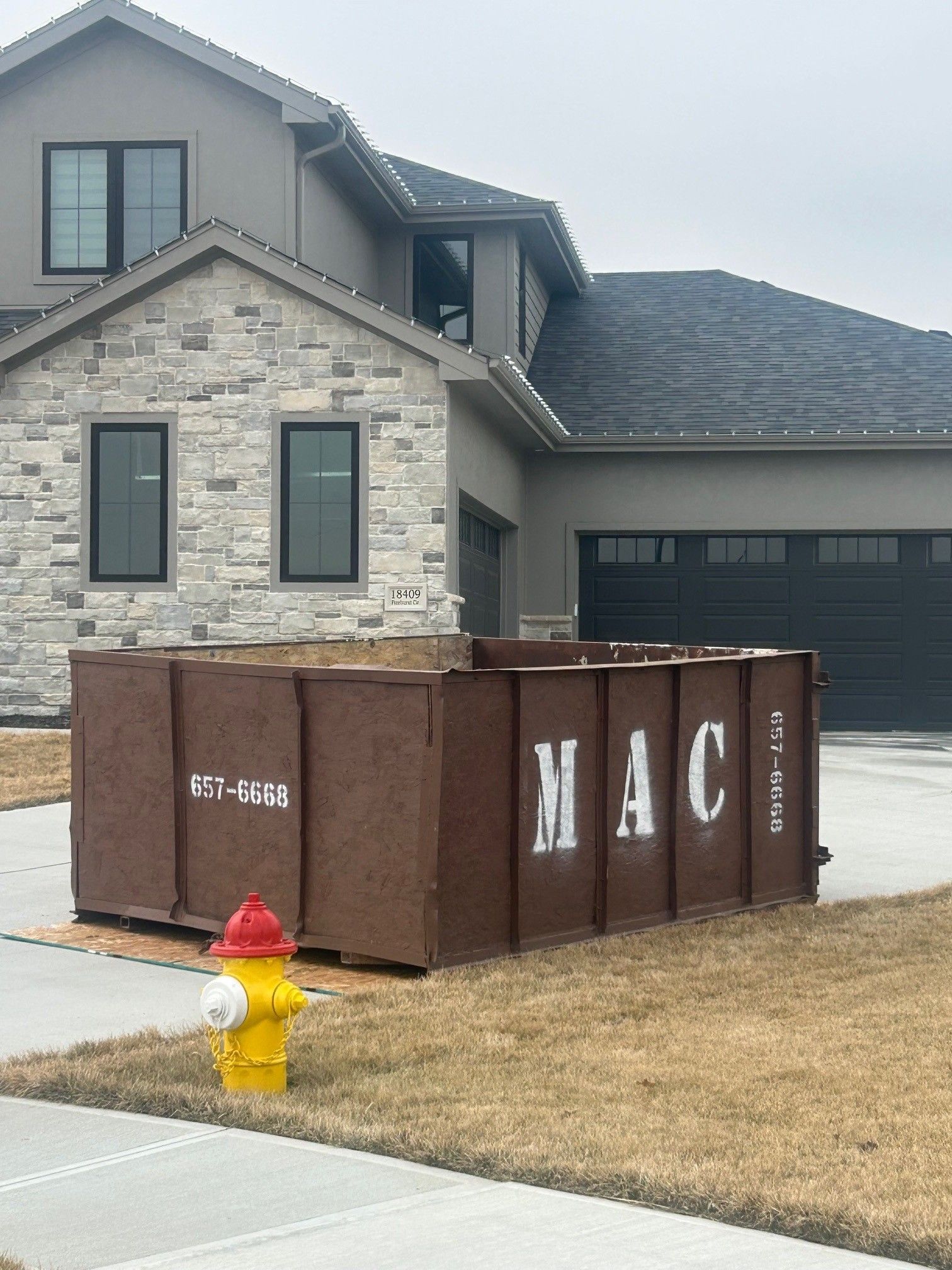 Two Green Dumpsters - Omaha, NE - Mac Containers Inc.